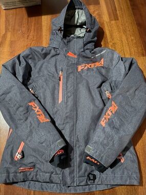 FXR Women's Dark Gray Ski Jacket with Orange Accents